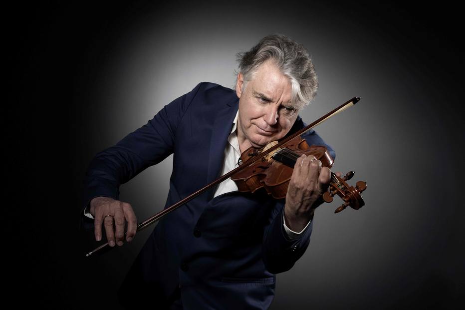 (FILES) In this file photo taken on May 31, 2017 French composer and jazz violinist Didier Lockwood plays the violin as he poses during a photo session in Paris. Famous jazz violinist Didier Lockwood died suddenly on February 18, 2018 in the morning in Paris at the age of 62, announced his agent in a statement. / AFP PHOTO / JOEL SAGET