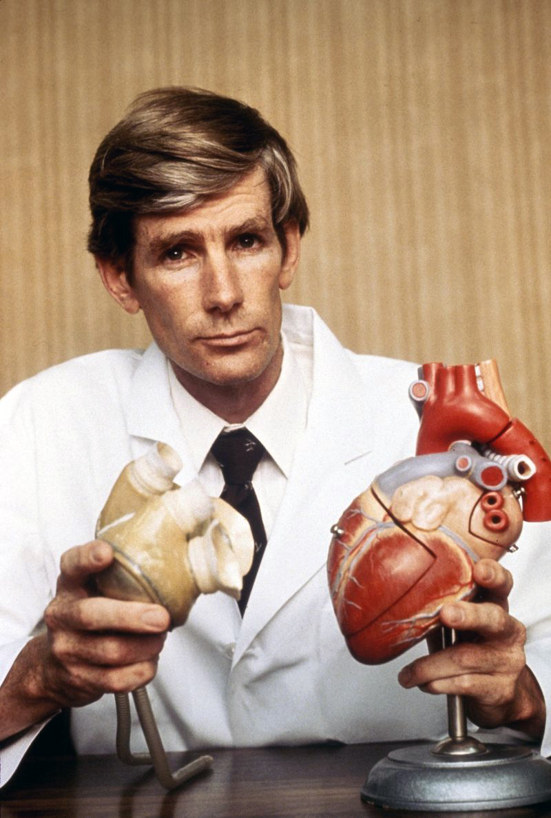 1982: Dr. William DeVries, Surgeon who performed the first permanent artificial heart transplant on a human patient circa 1982. DeVries was a first year medical student and one of the first research assistants hired by Kolff when he began his artificial heart program in Utah in 1967(Photo by Images Press/IMAGES/Getty Images)