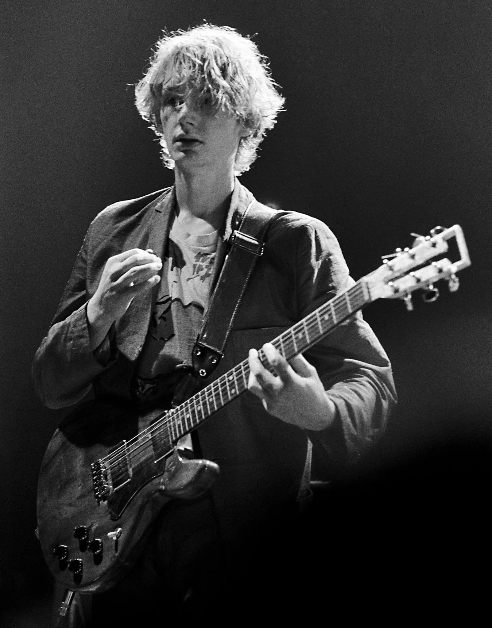 Keith Levene se apresentando com a Public Image Ltd. em Atlanta em 1980. Impulsionada por seu trabalho de guitarra e pelos vocais estridentes de John Lydon, a banda misturou gêneros. (Crédito da fotografia: Imagens de Tom Hill/Getty Images)